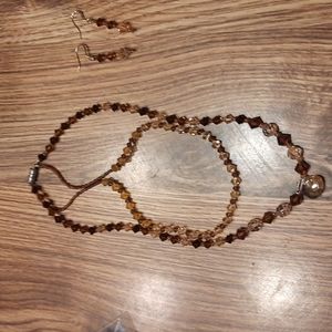 Swarovski crystal brown necklace and earrings set.